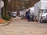 TrailersNET.jpg Trailers for the show, you can sorta see \'The Bus\' down the road image by FUTURE-PEACE