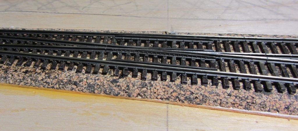 track spikes on concrete