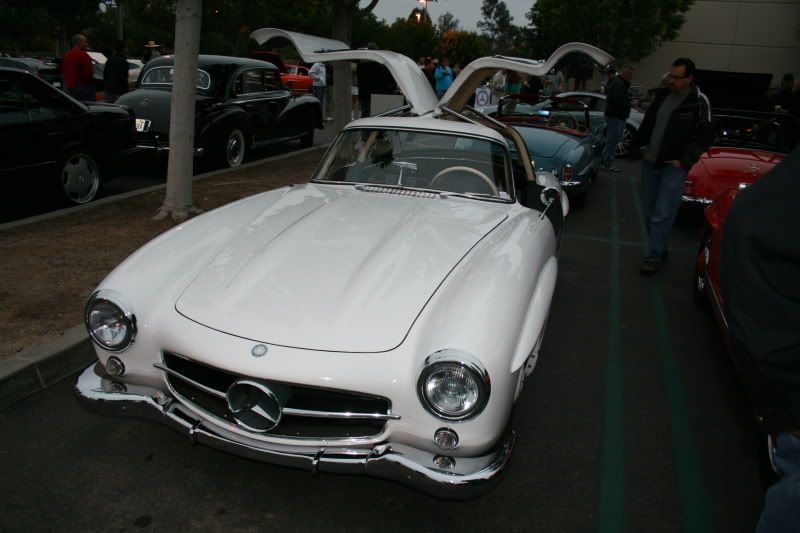 https://i119.photobucket.com/albums/o155/xXxTheDevilsRejectxXx/carsandcoffee044.jpg