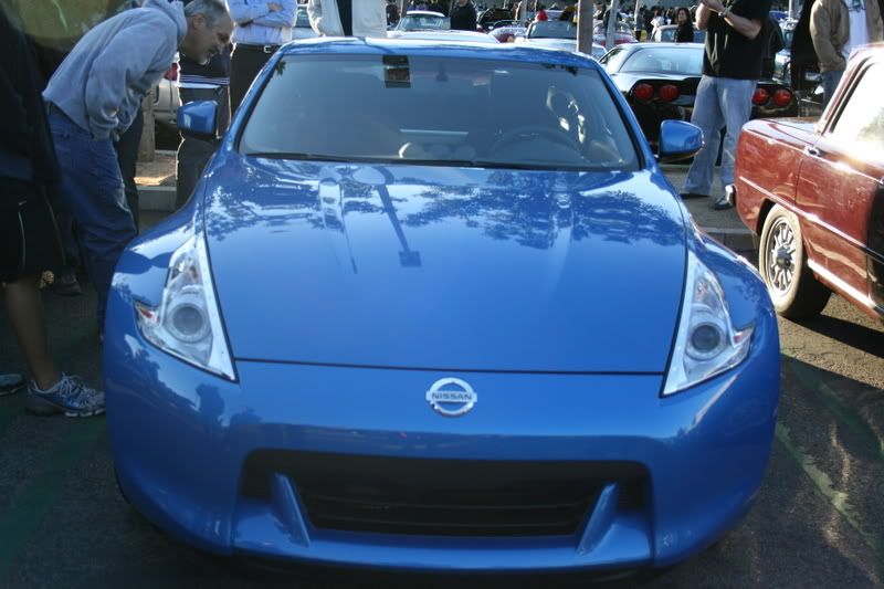 https://i119.photobucket.com/albums/o155/xXxTheDevilsRejectxXx/carsandcoffee045.jpg